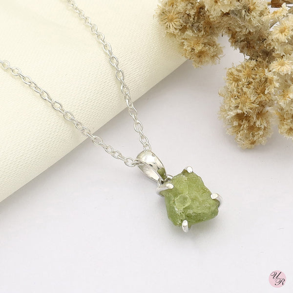 Unique peridot rough pendant, natural beauty, perfect for any occasion.